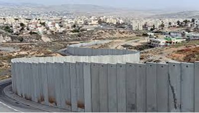 العدو الصهيوني يحذر من تخطي جدار الفصل العنصري
