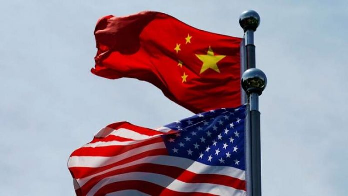 الصين تدعو واشنطن لرفع عقوباتها غير القانونية عن شركاتها